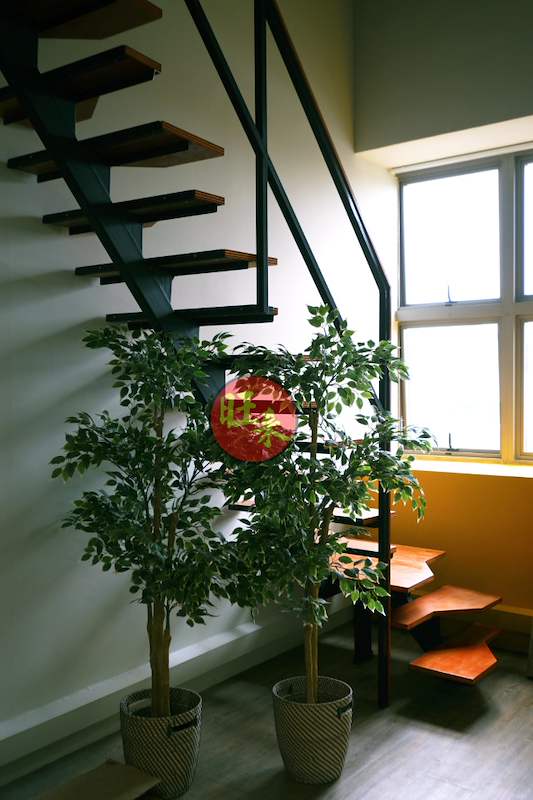 Open-tread staircase to the loft mezzanine beside a window, with potted plants below - V5000 Racking - V5-26 | Wong Lye Racking, Singapore Racking Manufacturer