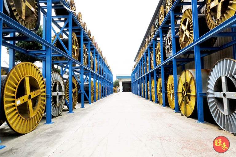 After: V10000 racking runs along an outdoor aisle with cable drums on every tier - V10000 Racking - V10-1 | Wong Lye Racking, Singapore Racking Manufacturer