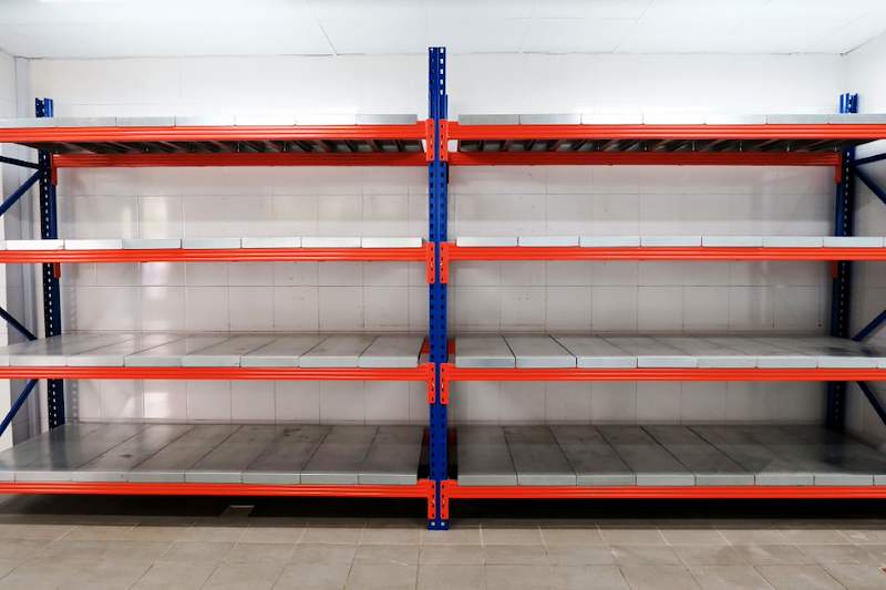 Front view of two long-span racking bays with four steel-decked levels, bays empty - Boltless Racking - B5 | Wong Lye Racking, Singapore Racking Manufacturer