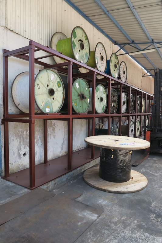 End view of the two-tier cable-drum rack with drums loaded on both tiers - V5000 Racking - V5-1 | Wong Lye Racking, Singapore Racking Manufacturer
