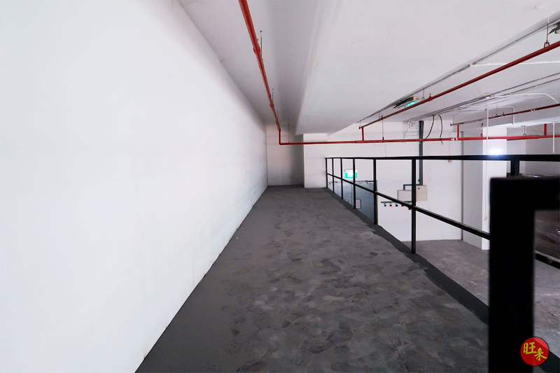 Upper mezzanine deck with grey flooring and black railing along the open edge - V5000 Racking - V5-17 | Wong Lye Racking, Singapore Racking Manufacturer