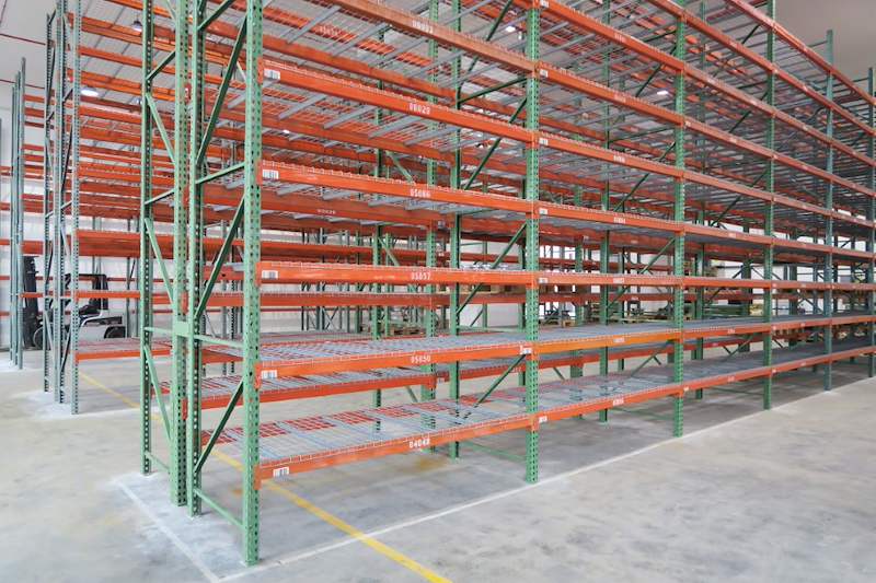 Pallet racking run with mesh decks on every level, viewed along the aisle line - V3000 Racking - V3-3 | Wong Lye Racking, Singapore Racking Manufacturer