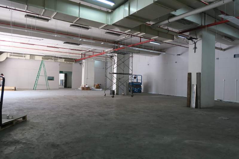 Before: bare warehouse unit with scaffold tower and ladder before installation - Boltless Racking - B7 | Wong Lye Racking, Singapore Racking Manufacturer