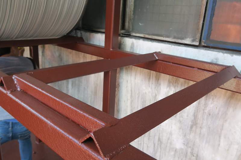 Empty upper-tier bay showing the V-shaped steel cradle beams that hold a drum - V5000 Racking - V5-1 | Wong Lye Racking, Singapore Racking Manufacturer