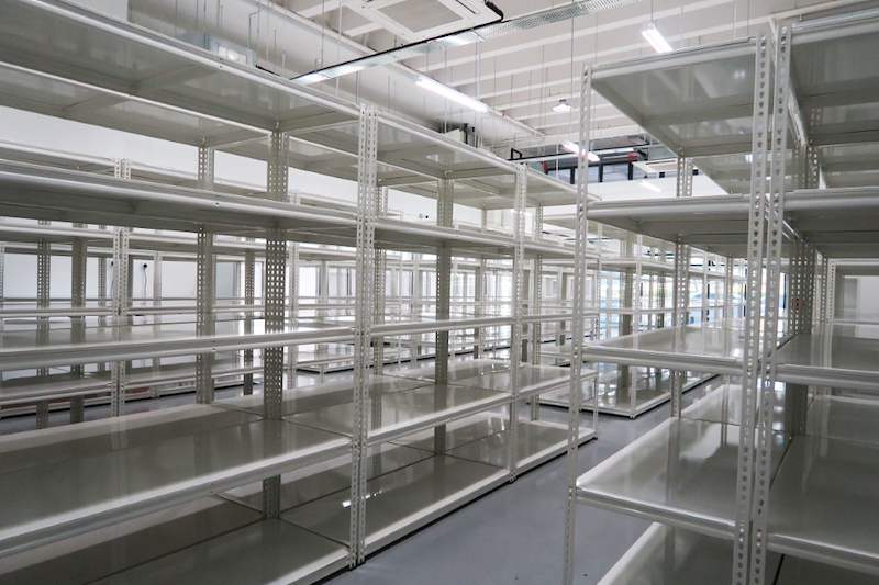White boltless shelving blocks with five levels, viewed along the rows - Boltless Racking - B8 | Wong Lye Racking, Singapore Racking Manufacturer