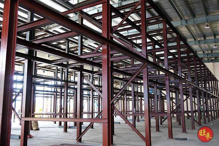 Red-oxide primed steel racking frame with columns and beams erected, before the drums were loaded - V10000 Racking - V10-1 | Wong Lye Racking, Singapore Racking Manufacturer