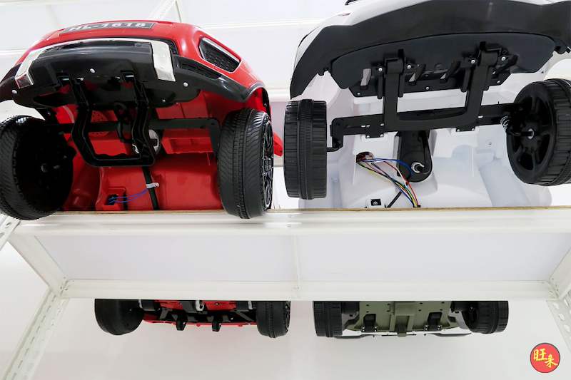 Underside of two ride-on toy cars on the boltless shelf board, viewed from below - Boltless Racking - B3 | Wong Lye Racking, Singapore Racking Manufacturer