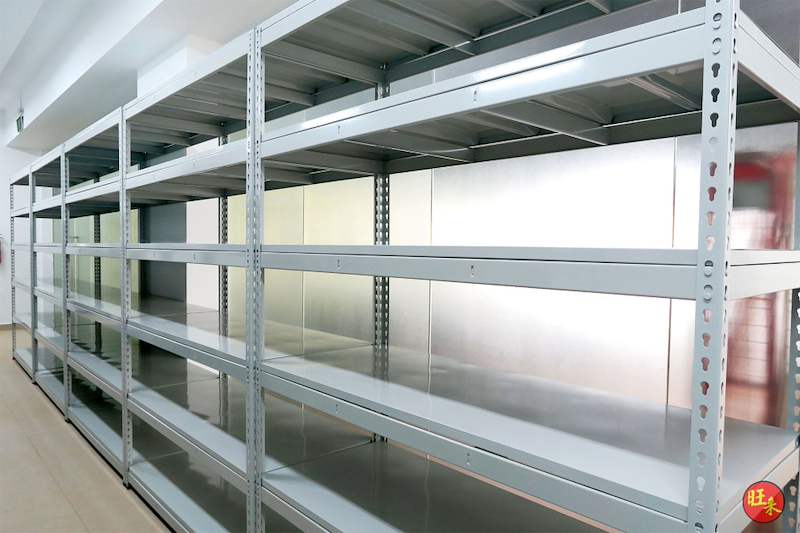 Boltless shelving bay showing slotted uprights and steel shelf panels, close view - Boltless Racking - B5 | Wong Lye Racking, Singapore Racking Manufacturer