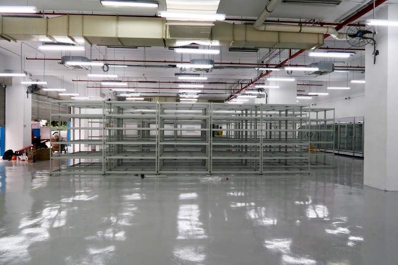 Rows of boltless shelving across the unit, viewed from the entrance, shelves empty - Boltless Racking - B7 | Wong Lye Racking, Singapore Racking Manufacturer