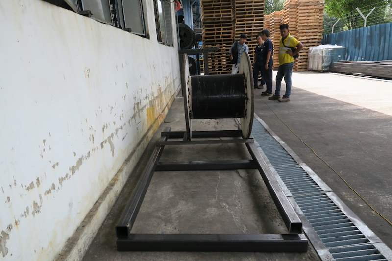 Empty steel base frame for the drum rack laid along the wall and drain channel - V5000 Racking - V5-1 | Wong Lye Racking, Singapore Racking Manufacturer