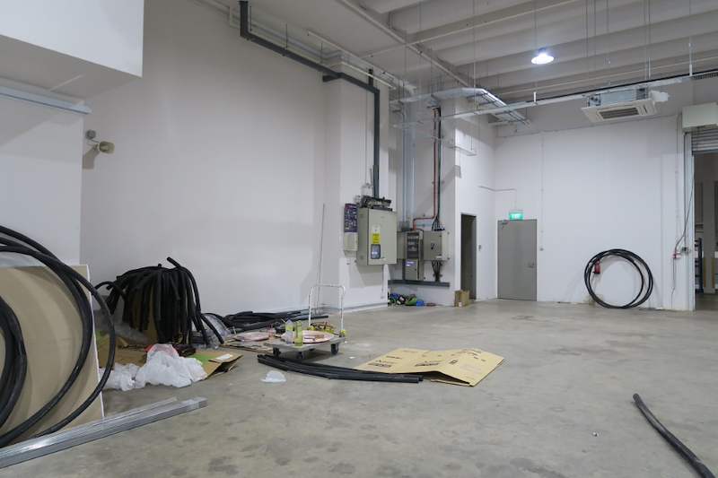 Before: corner of the unit with cable drums and coils on the floor - Boltless Racking - B8 | Wong Lye Racking, Singapore Racking Manufacturer