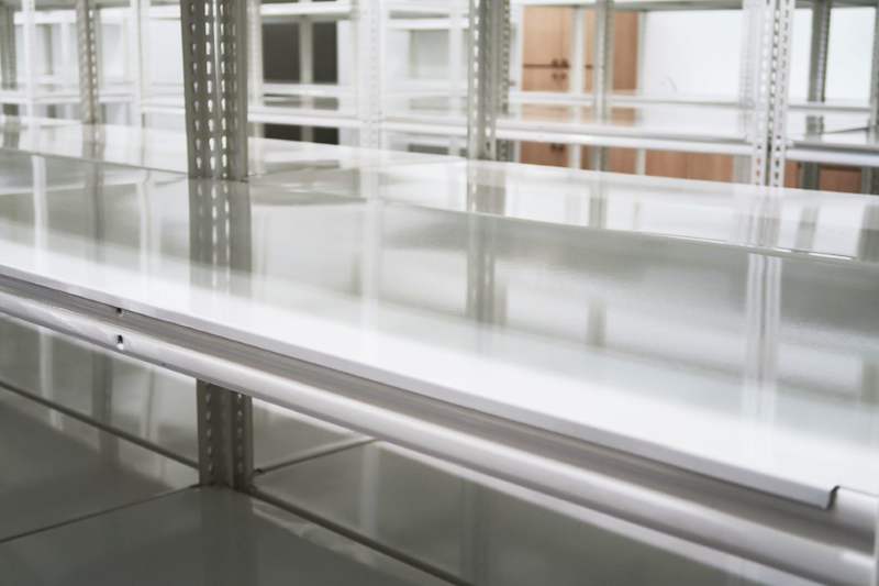 Steel shelf panel of white boltless shelving, close view along the shelf surface - Boltless Racking - B8 | Wong Lye Racking, Singapore Racking Manufacturer