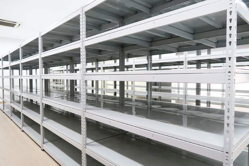 Rows of boltless shelving with steel shelves, all empty, under ceiling cassette air-conditioning - Boltless Racking - B5 | Wong Lye Racking, Singapore Racking Manufacturer