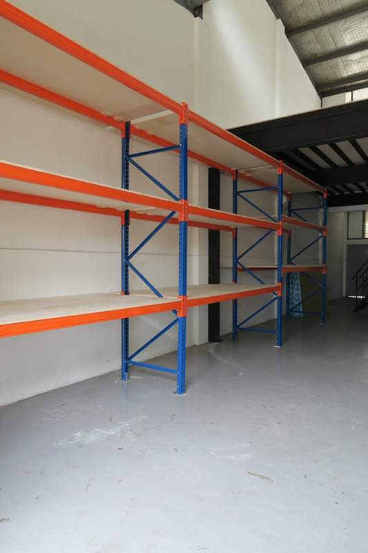 V3000 racking bays along the wall with a black steel mezzanine beyond - V3000 Racking - V3-2 | Wong Lye Racking, Singapore Racking Manufacturer