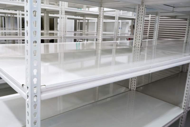 White boltless shelving with steel shelf panels, viewed along a shelf level - Boltless Racking - B8 | Wong Lye Racking, Singapore Racking Manufacturer