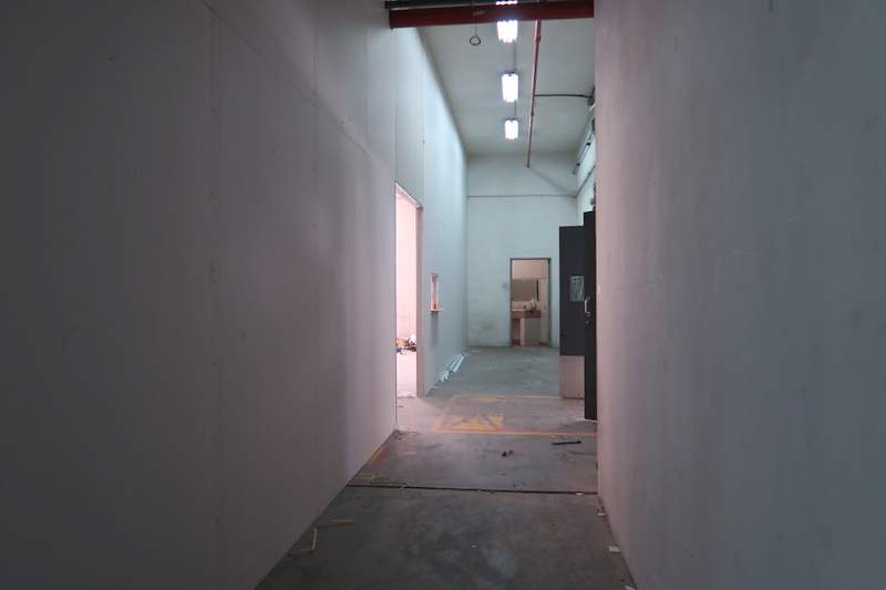 Before: corridor between new partition walls in the unit - Boltless Racking - B7 | Wong Lye Racking, Singapore Racking Manufacturer