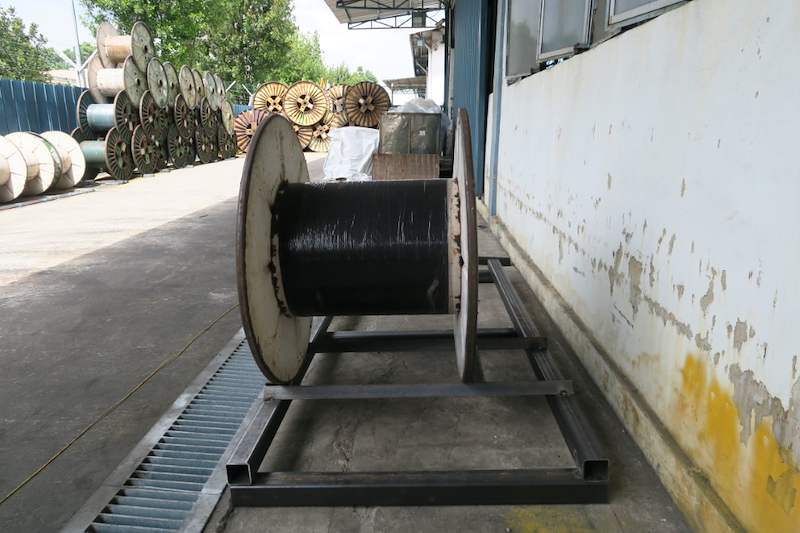 Cable drum on the low steel base frame along the wall, viewed along the run - V5000 Racking - V5-1 | Wong Lye Racking, Singapore Racking Manufacturer